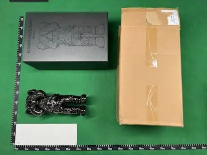 Kaws Astronaut Figure QC photo