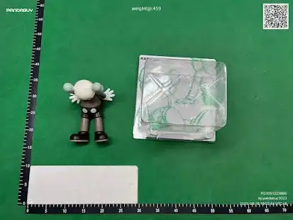 Sitting Kaws Figures (3 Variants) QC photo